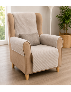 Sillón orejero marrón con...